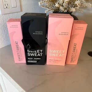 Sweat Sweat Bundle. Includes 2 waist trimmers and two workout Enhancers.
